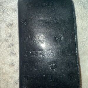 CHANEL Black embossed leather wallet